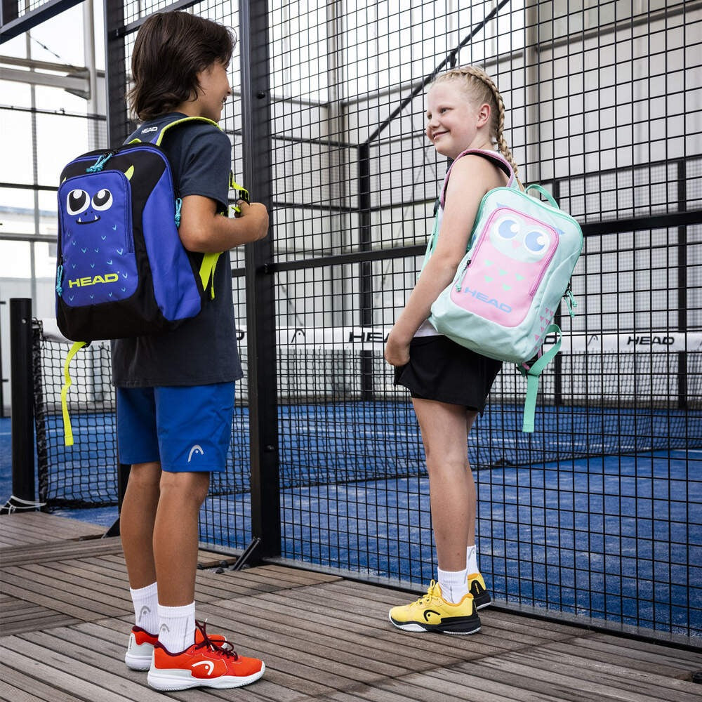 Mochila HEAD Kids Tour 14L Monster - vista lateral mostrando compartimento traseiro para raquete e bolsos laterais