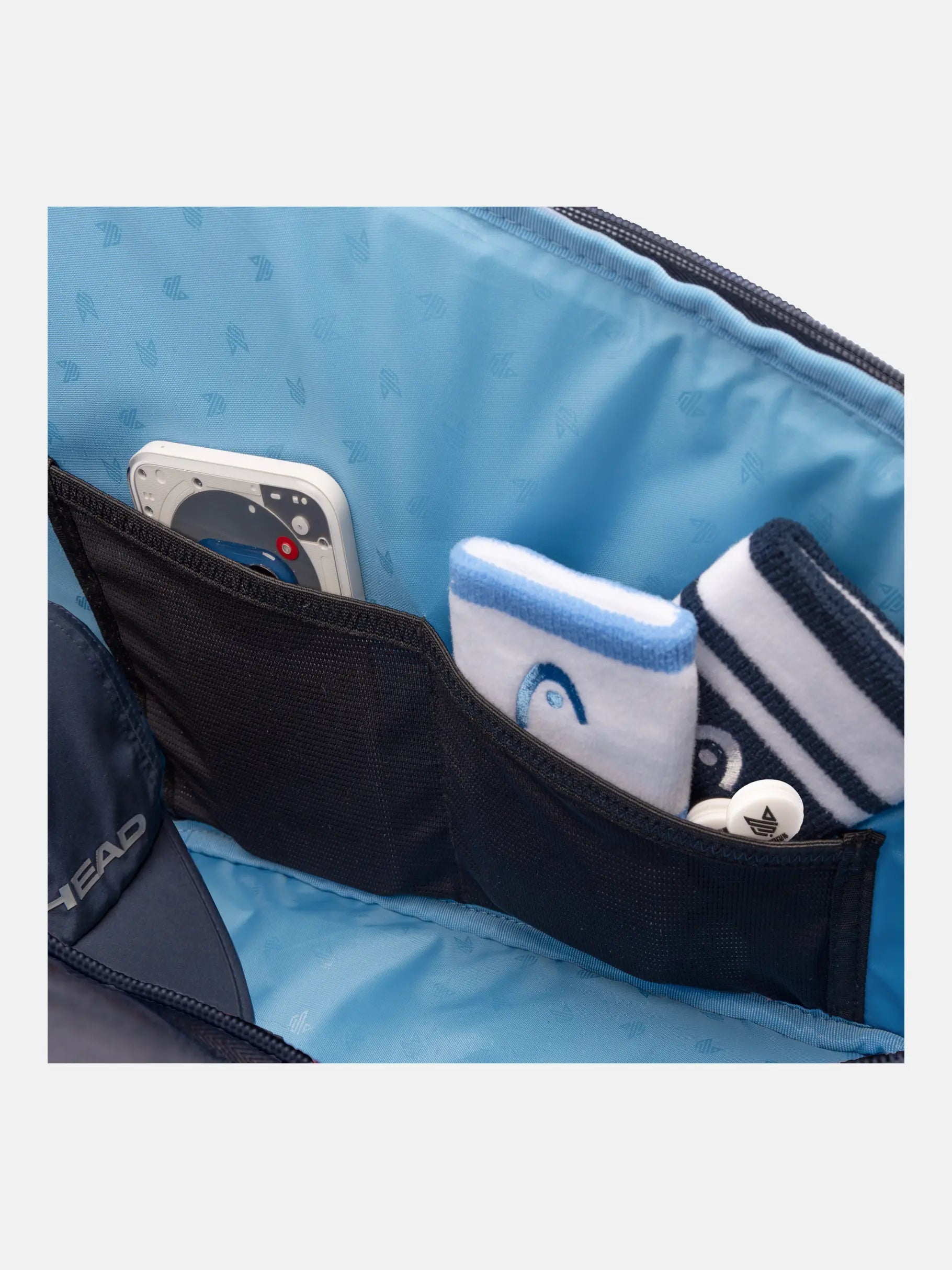 Detalhe do compartimento para acessórios do saco de raquetes HEAD Pro Racquet Bag XL NV.