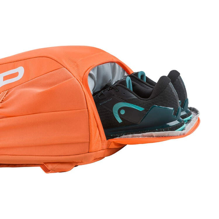 Mochila HEAD Tour 25L Laranja - detalhe do compartimento independente para sapatilhas de ténis